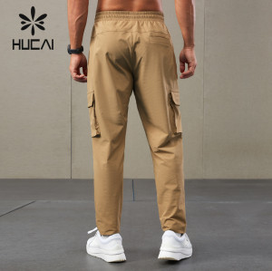 HUCAI OEM Mens Sports Joggers Quick Drying Adjustable Buckle Sweat Pants Factory