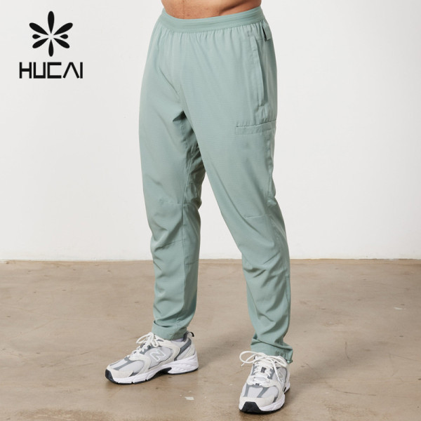 HUCAI OEM Custom Jogger pants Quick Drying Fabric Mens Running  Activewear Manufacturer