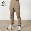 HUCAI OEM Custom Jogger pants Quick Drying Fabric Mens Running  Activewear Manufacturer