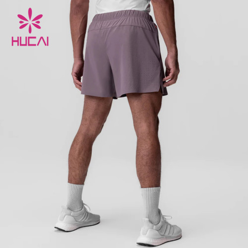 HUCAI OEM Mens Sports Shorts Hidden Zipper Pocket split Hem Custom Activewear Manufacturers