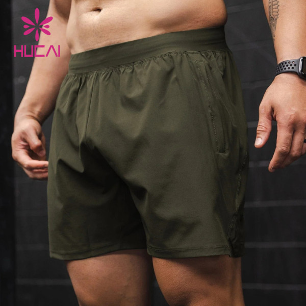 HUCAI OEM Mens Sports Shorts Hidden Zipper Pocket split Hem Custom Activewear Manufacturers