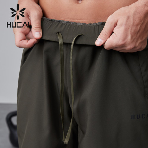 HUCAI OEM fitness shorts elastic waistband invisible zipper pocket sportswear manufacturer