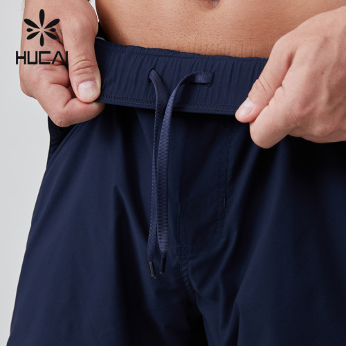 HUCAI OEM gym shorts 2 In 1 embroidered patch Hidden Zipper Pocket activewear Manufacturer