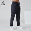 HUCAI OEM Men's Jogger Polyester Woven Label Rivets Zipper Lightweight Sports Pants Manufacturer