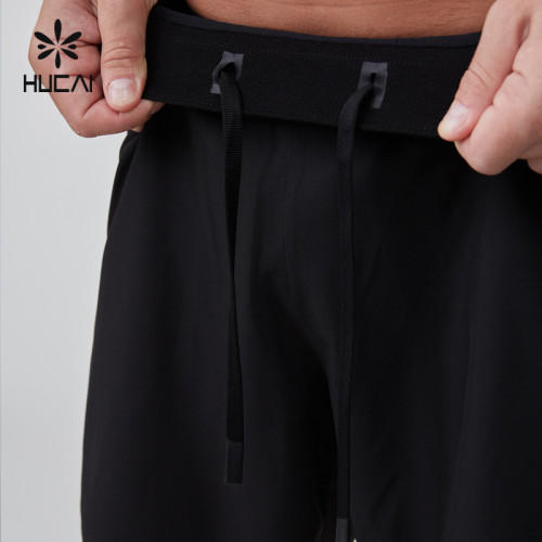 HUCAI OEM Men's Shorts Polyester Spandex Split Hem Reflective Heat Transfer Active Gym Wear Manufacturer