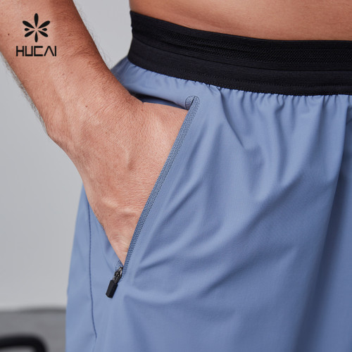 HUCAI OEM Gym Shorts Rubber Zipper Pocket Spliced Waistband 2 in 1 Running Pants Activewear Supplier