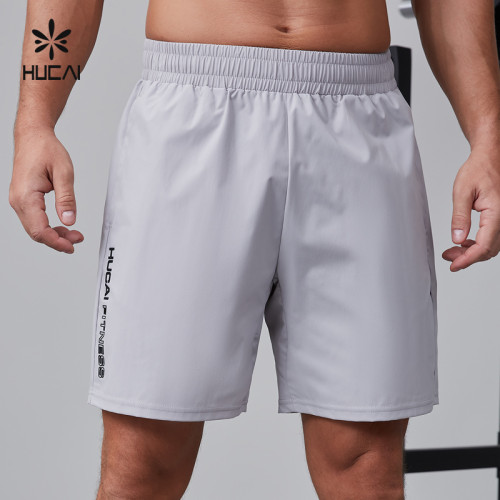 HUCAI Activewear Manufacturer|Custom Gym Shorts 100% polyester Split Hem Workout Sportswear