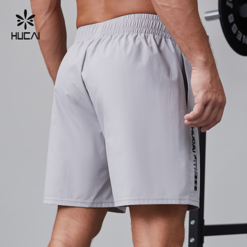 HUCAI Activewear Manufacturer|Custom Gym Shorts 100% polyester Split Hem Workout Sportswear