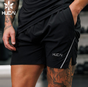 HUCAI OEM Mens Sports Shorts Hidden Zipper Pocket split Hem Custom Activewear Manufacturers