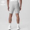 HUCAI Customized Men's Sportswear Laser Punching 2-in-1 Fitness Shorts Manufacturer