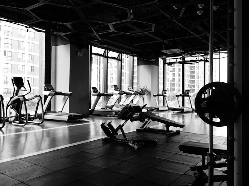 Man training in gym wearing layered activewear