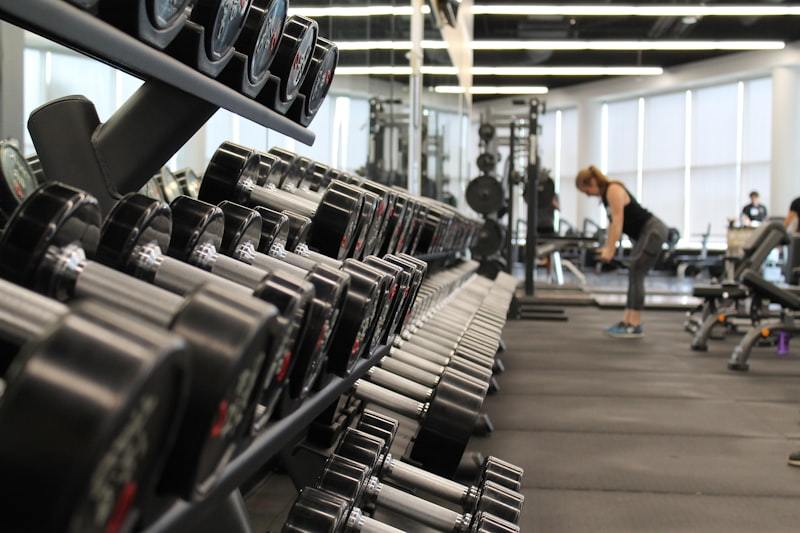 Man training in gym wearing performance activewear