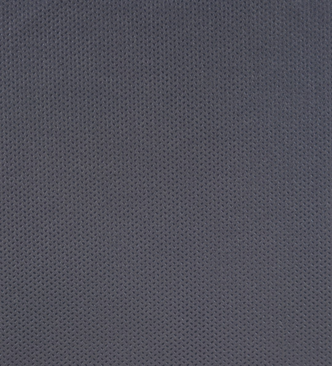Close-up of a micro-perforated technical knit, an alternative to mesh panels for zoned airflow
