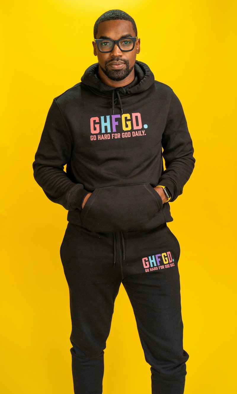 man wearing black hoodie and sweatpants