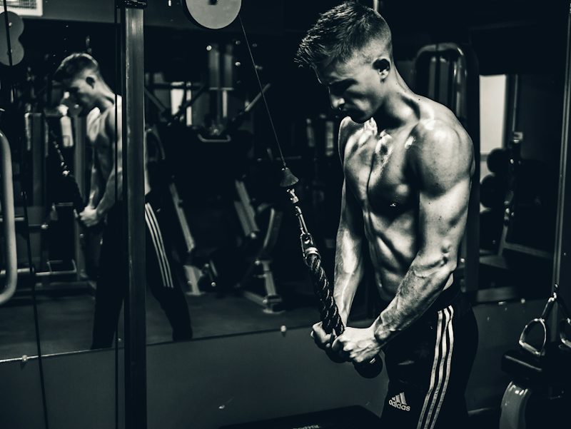 man exercising in a training session