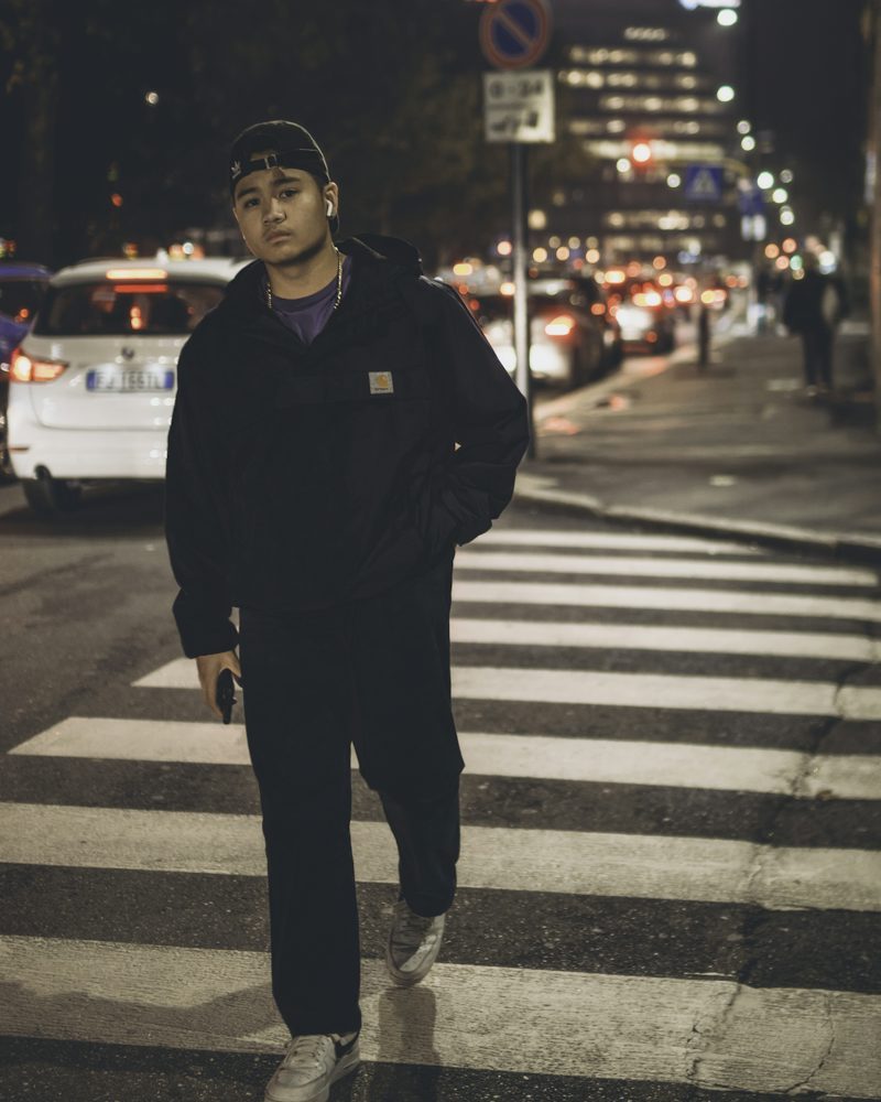 man wearing a jacket and utility trousers