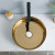 luxuriöse runde Form goldene Farbe Arbeitsplatte Waschbecken Keramik Bad Waschbecken Großhandel