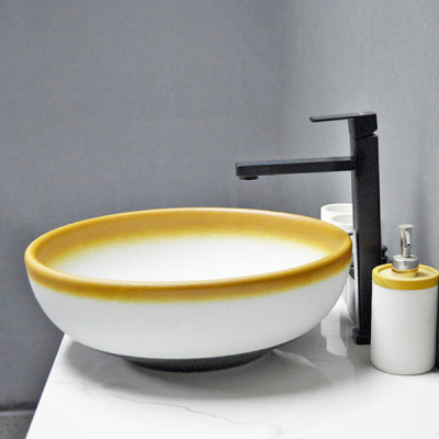 Basin bathroom ceramic white with yellow color hand wash basin for home or hotel