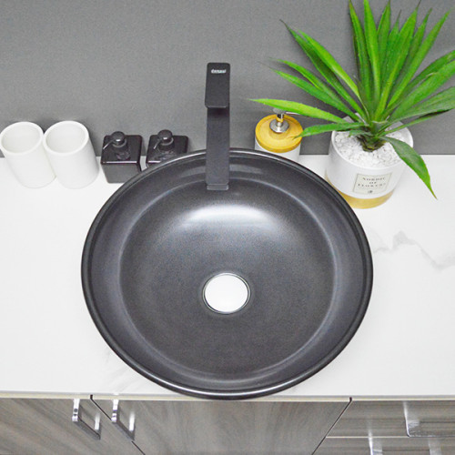 Fregaderos artísticos de la flor negra redonda de la forma del lavabo de cerámica para el cuarto de baño