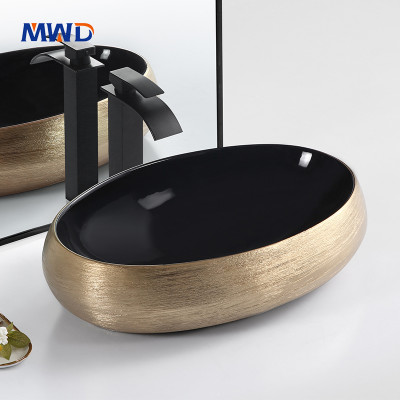 MWD Artisan Oval Vessel Sinks | Black & Gold Ceramic Basins with Textured Designs