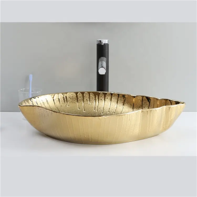 Hotel counter top glossy gold bathroom sink gold hand face wash basin ceramic art basin