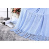 La manta del tiro del ODM con las borlas vende al por mayor la manta hecha punto decoración suave de la cubierta del sofá del sofá