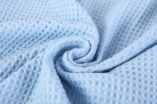 Оптовое мягкое легкое вязаное одеяло с вафельным рисунком с кисточками от китайской фабрики