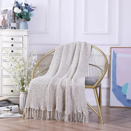 Couverture de jet en gros tricoté en chenille moelleux avec des glands décoratifs