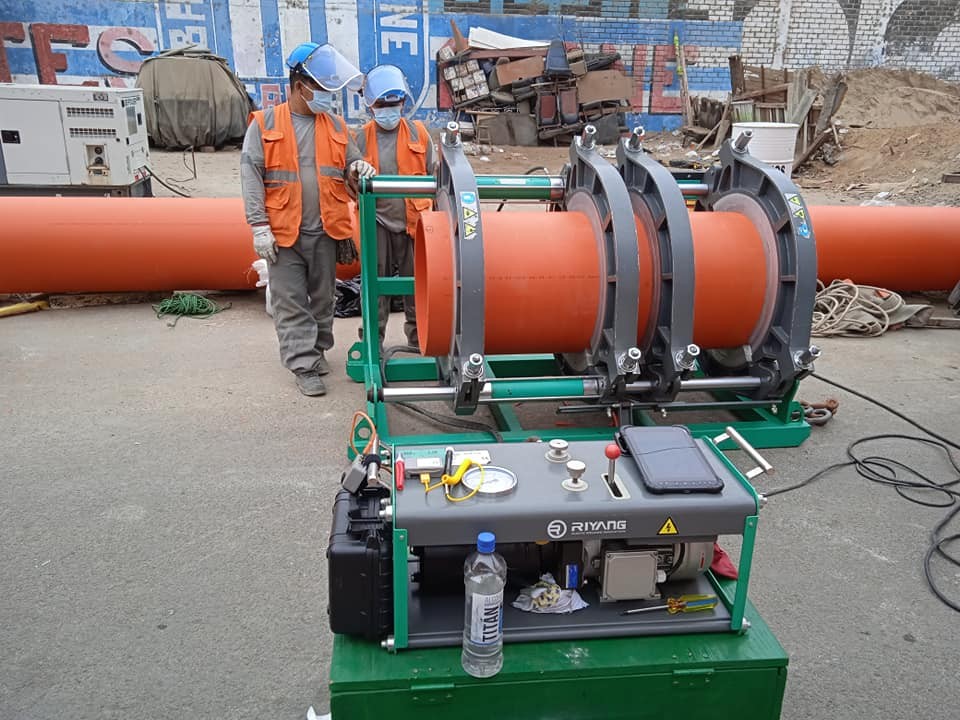 Butt fusion welding machine in an industrial workshop