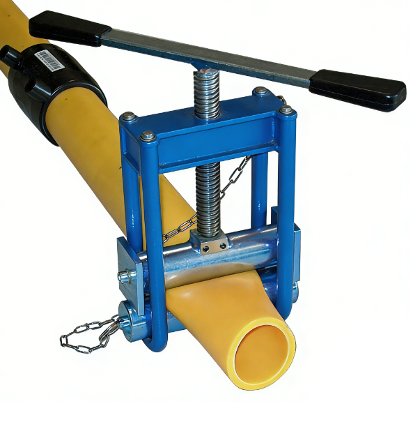 Operator compressing a plastic pipe with a squeeze-off tool
