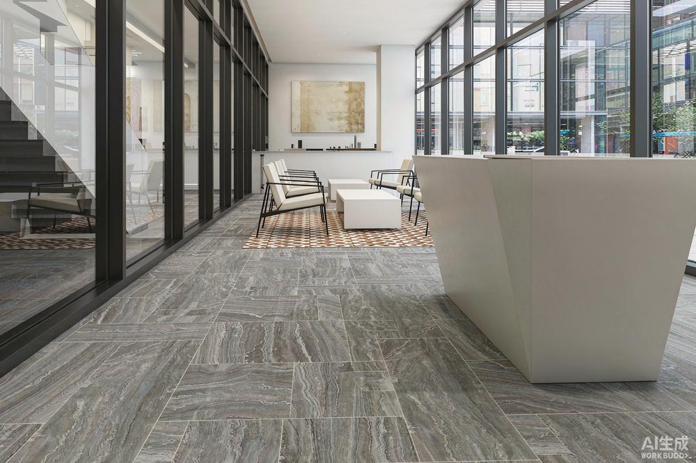 Finished commercial office lobby with grey stone-pattern luxury vinyl tile flooring and floor-to-ceiling windows