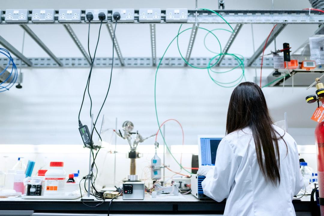 Scientist working in a laboratory with precise equipment