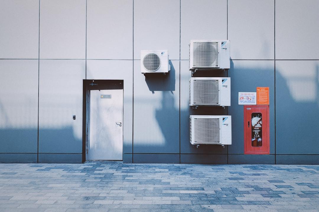 Industrial dehumidifier and HVAC units installed in a facility wall
