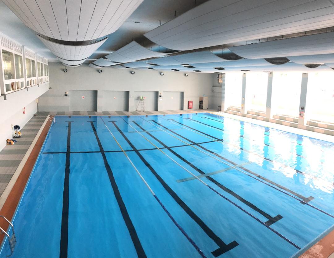 Split heating cooling dehumidifier for swimming pool