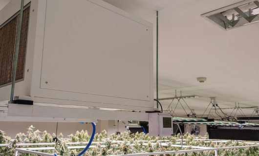 Industrial warehouse racking where a dehumidifier runs continuously to control humidity