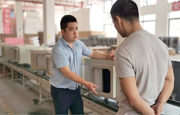 Factory QC discussion on the production floor