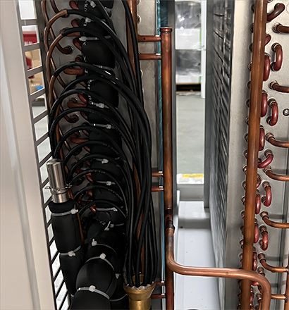 Refrigerant dehumidifier running in a cool damp basement