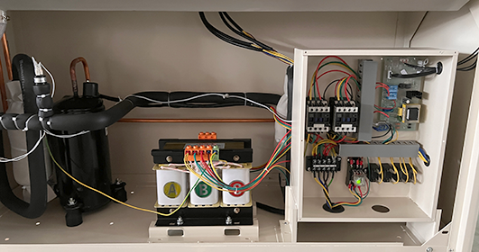 Touchscreen control panel on an industrial manufacturing machine