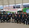 Сотрудники компании TieNiu на выставке сельскохозяйственных тракторов в Циндао, Китай