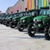 Employees of TieNiu company attend agricultural tractor exhibition in Qingdao, China