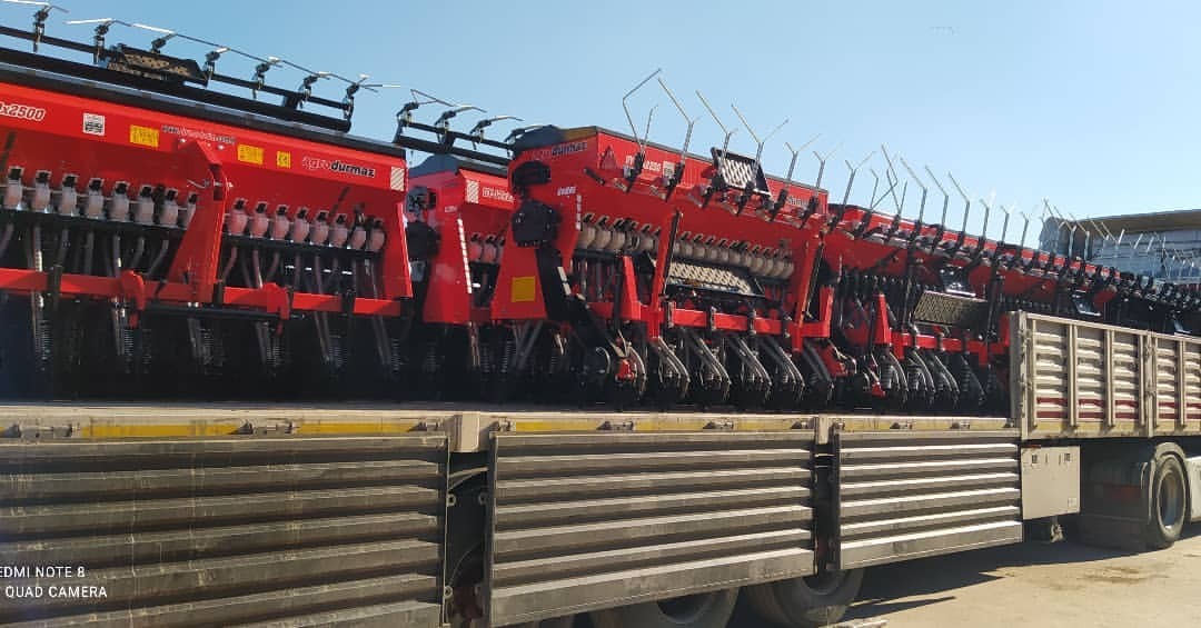 Tractor with various attachments for different tasks