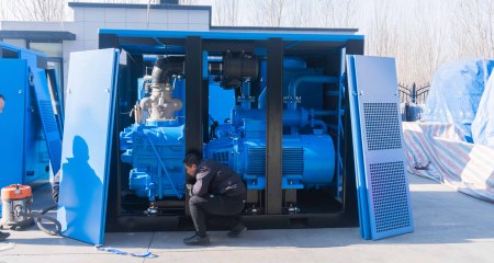 What type of compressor is most often used in large chillers?