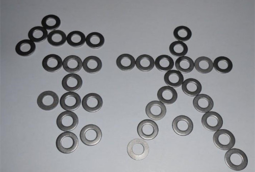 Machined titanium washer with square shape for fixed equipment