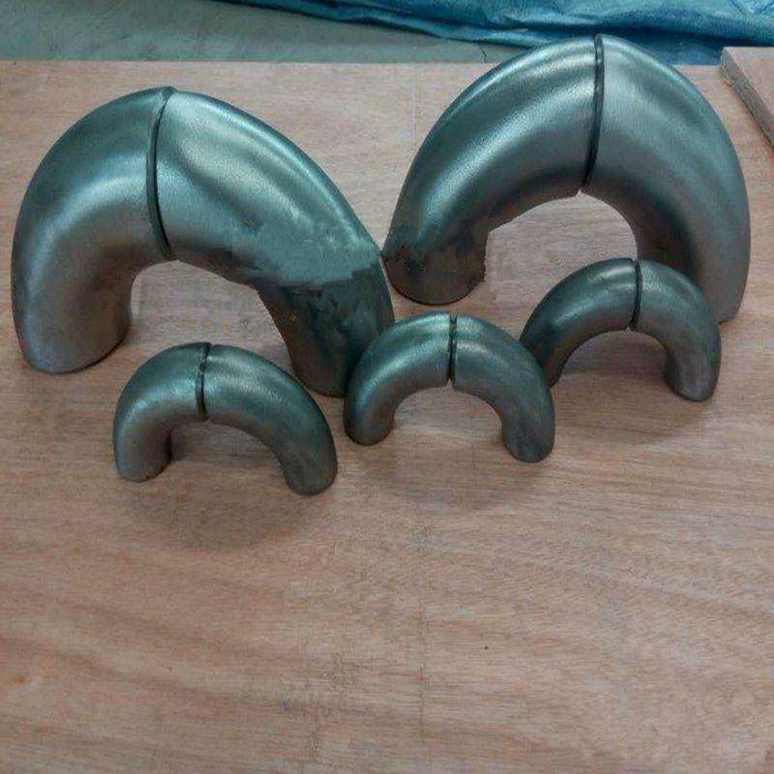 What preparations should be done before welding zirconium pipe fittings?