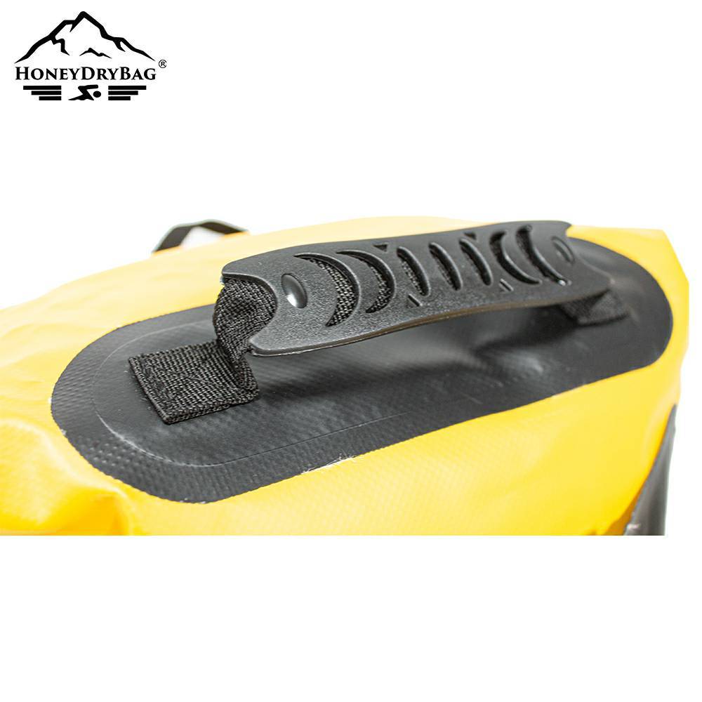 Plastic carrying handle on the top of the waterproof backpack.