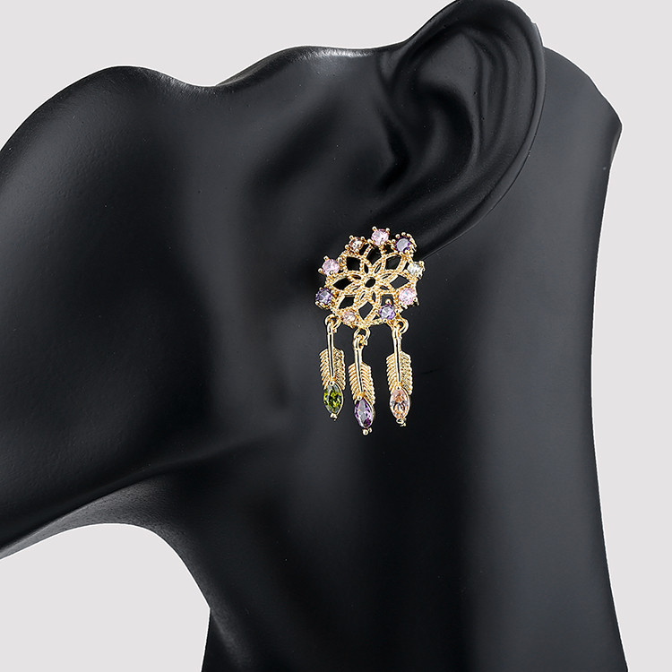 aretes a granel con dijes brillantes