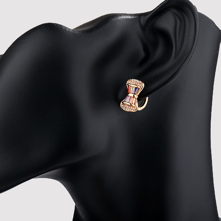 cubic zirconia bow design huggie earrings