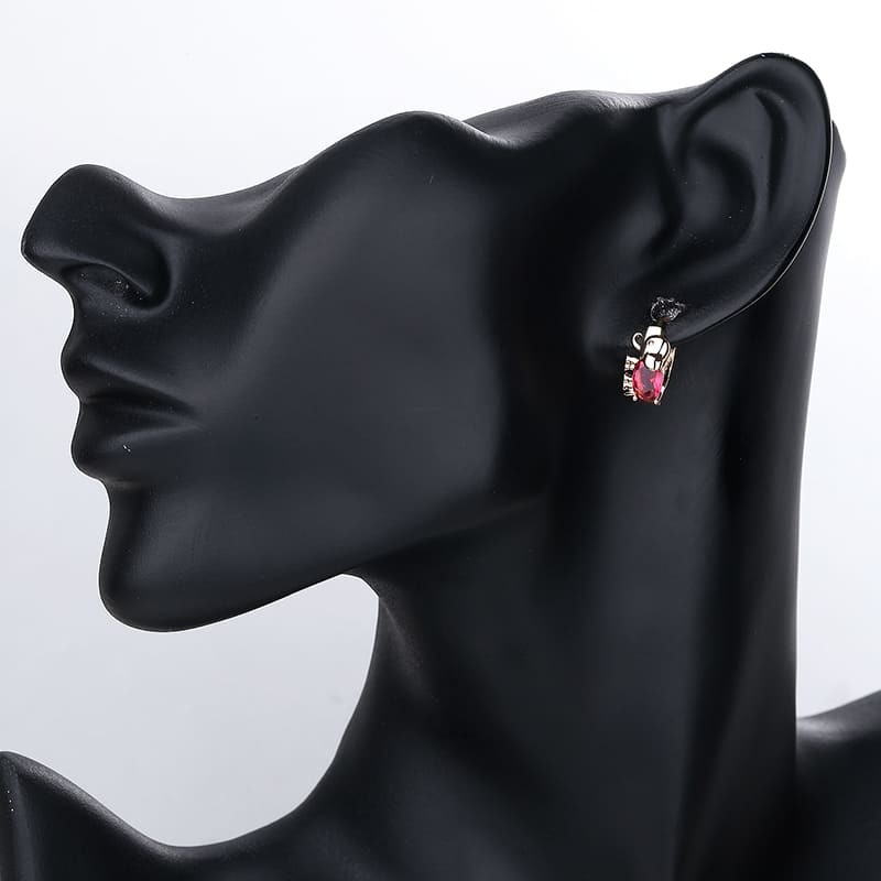 red turtle huggie earring wearing