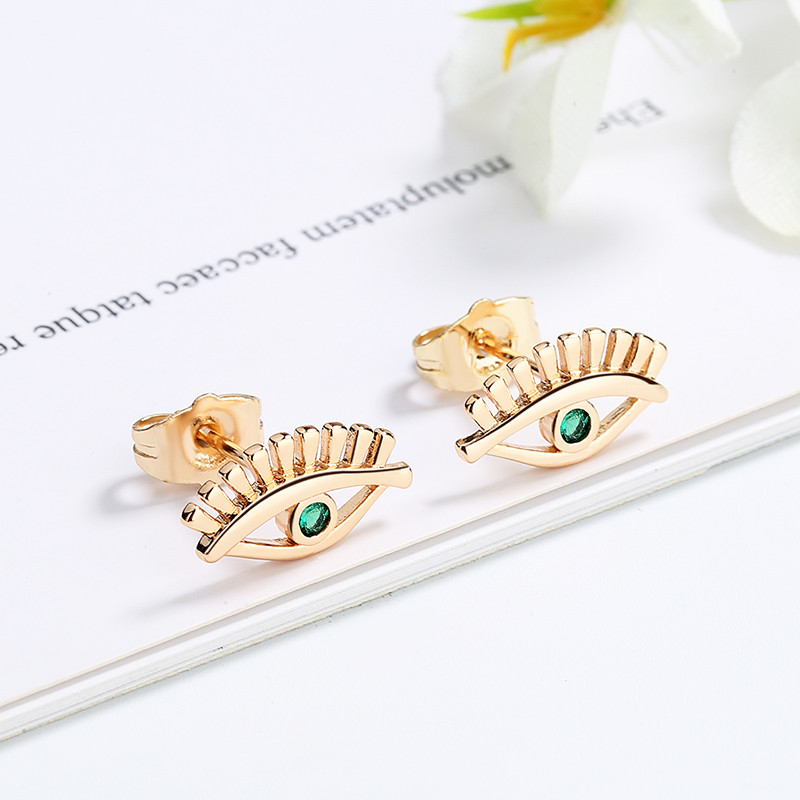 green eye stud earring