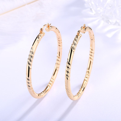 Quality Brass Jewelry Factory Dircet Supply| Women Carving Pattern Large Twisted Hoop Earrings Dealer | 18 karat Gold over Brass